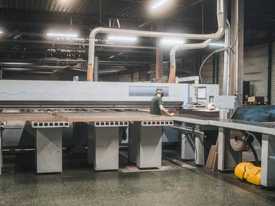 Illustrative photo: a panel saw line